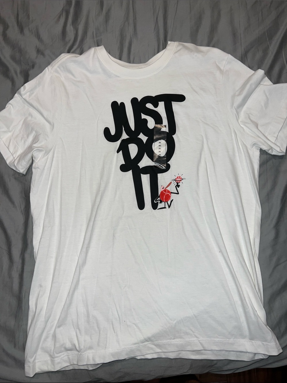 Nike White Short-Sleeve 'Just Do It' Graphic Tee with Red Accent